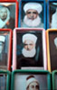Photographies des Shaykhs de confr�ries soufies de la r�gion d'Alep. Vitrine d'un magasin de photographe. 
La croyance populaire veut qu'un disciple qui porte la photo de son guide spirituel soit prot�g� par sa 